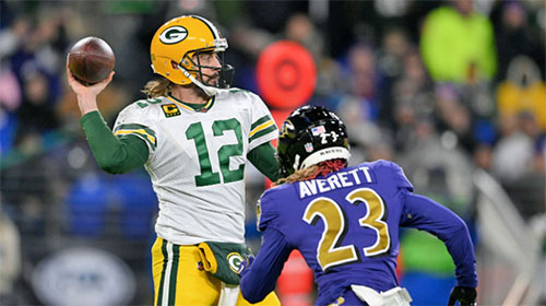 Quarterback Aaron Rodgers ties Brett Favre's Packers record for career touchdown passes.
